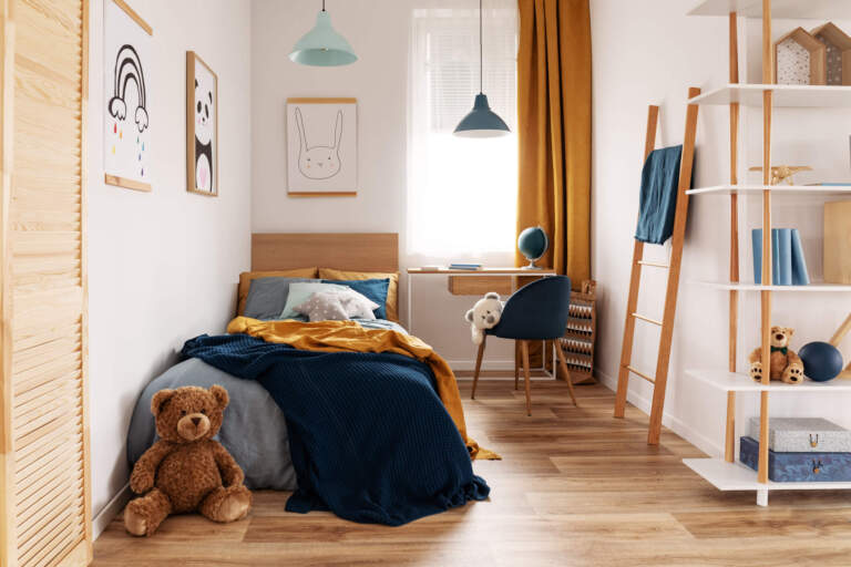 Multifunctional bedroom and workspace with book case and lamp